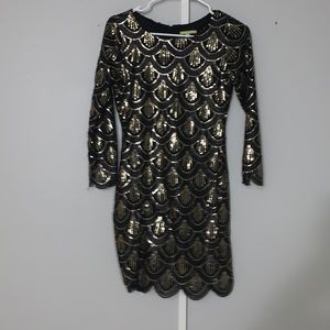 Small 20s themed dress. Black/gold/silver